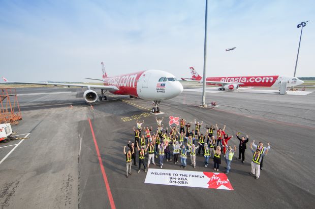 Layanan AirAsia, Tak Perlu Antre Urus Bagasi, 2 Menit Beres