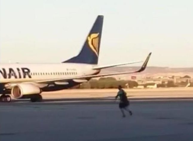Late, Man Chase Plane at Airport Apron
